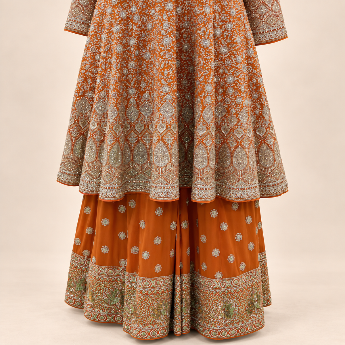 Vibrant Orange Embellished Salwar Suit with Ornate Dupatta