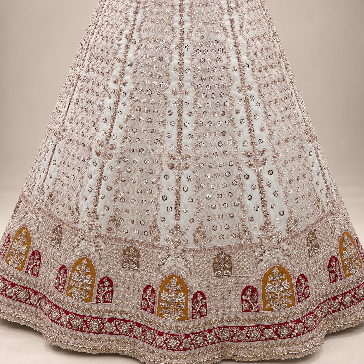 IVORY CREAM BRIDAL LEHENGA WITH WINE & MUSTARD MOTIF DETAILING