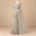 White Floral Thread Embroidery with Shimmering Embellishments and Intricate Floral Border Detailing